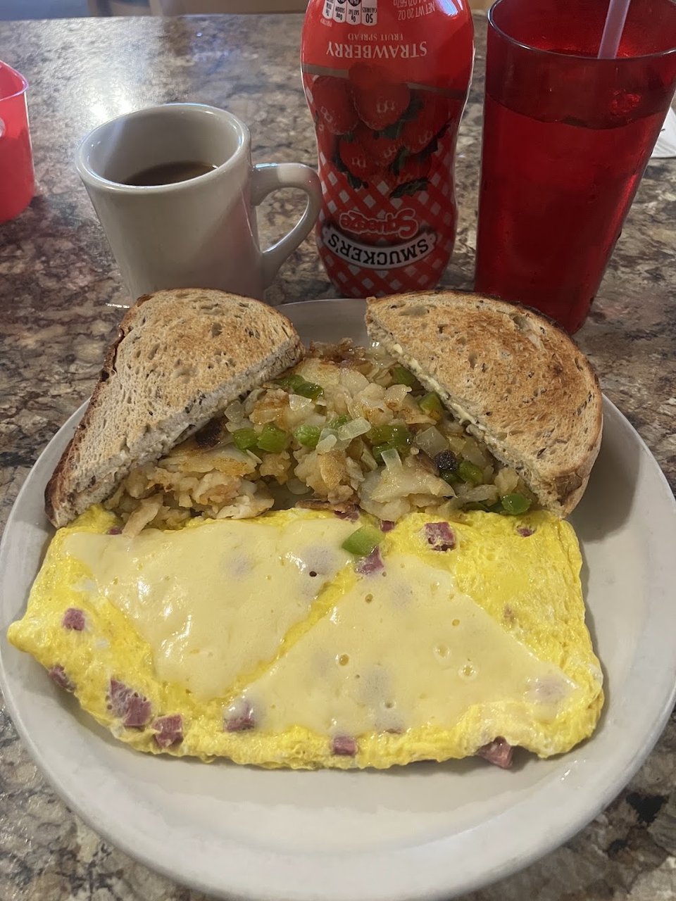 Omelette and Hash Brown Sandwich Breakfast
