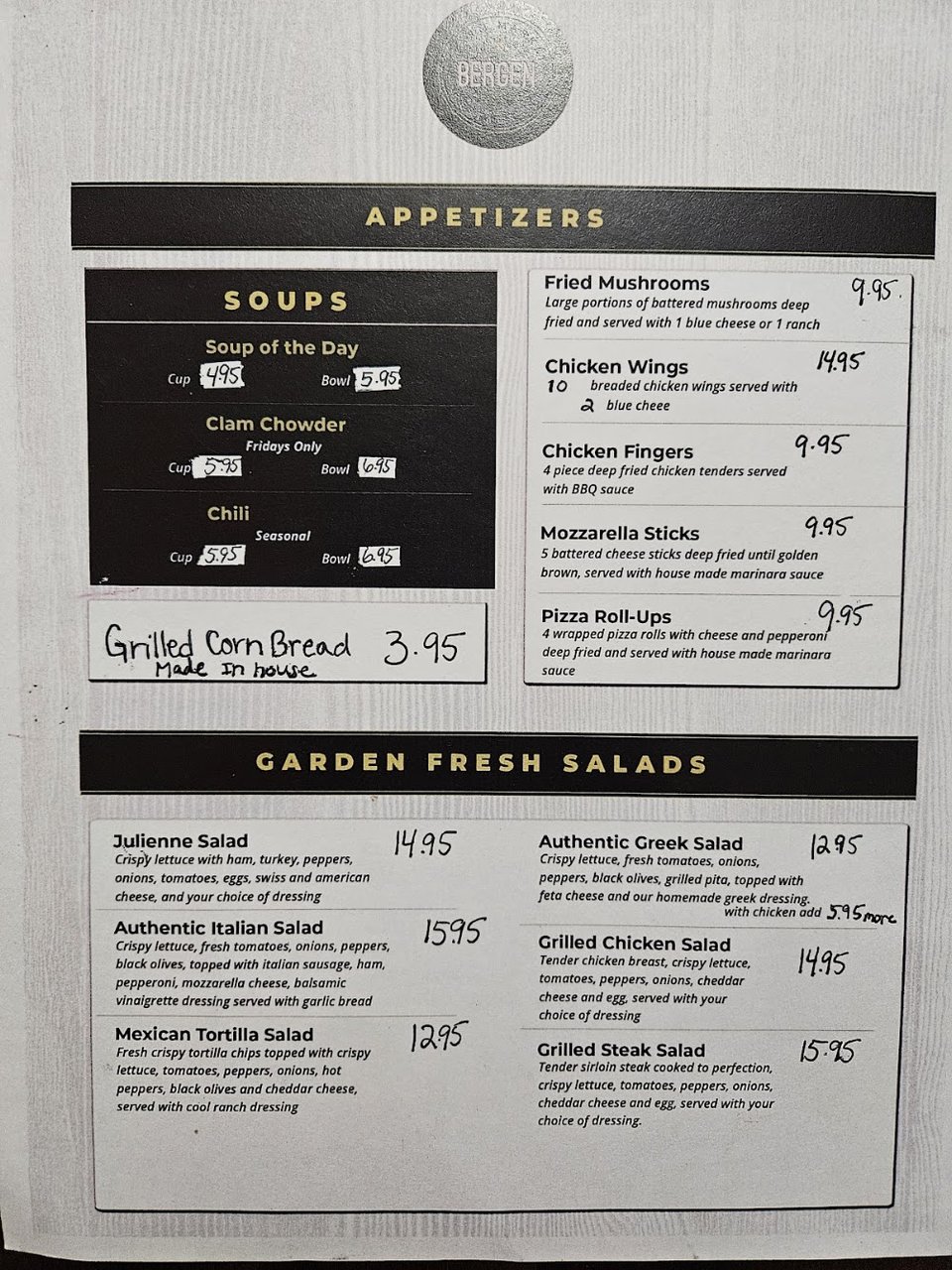 Printed menu showing sandwiches, salads, and appetizers.